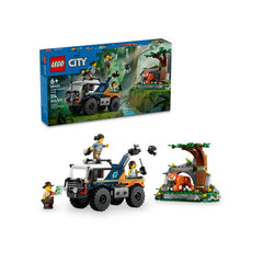 LEGO City Jungle Explorer Off-Road Truck set with three explorer minifigures, a tiger figure, and jungle cave backdrop, showcasing adventure.