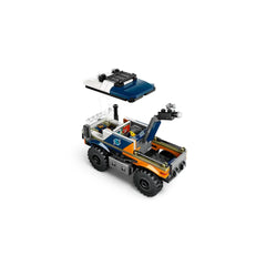 Lego City Jungle Explorer Off-Road Truck displayed in vibrant colors, featuring rugged tires, movable camera boom, and a detailed design.