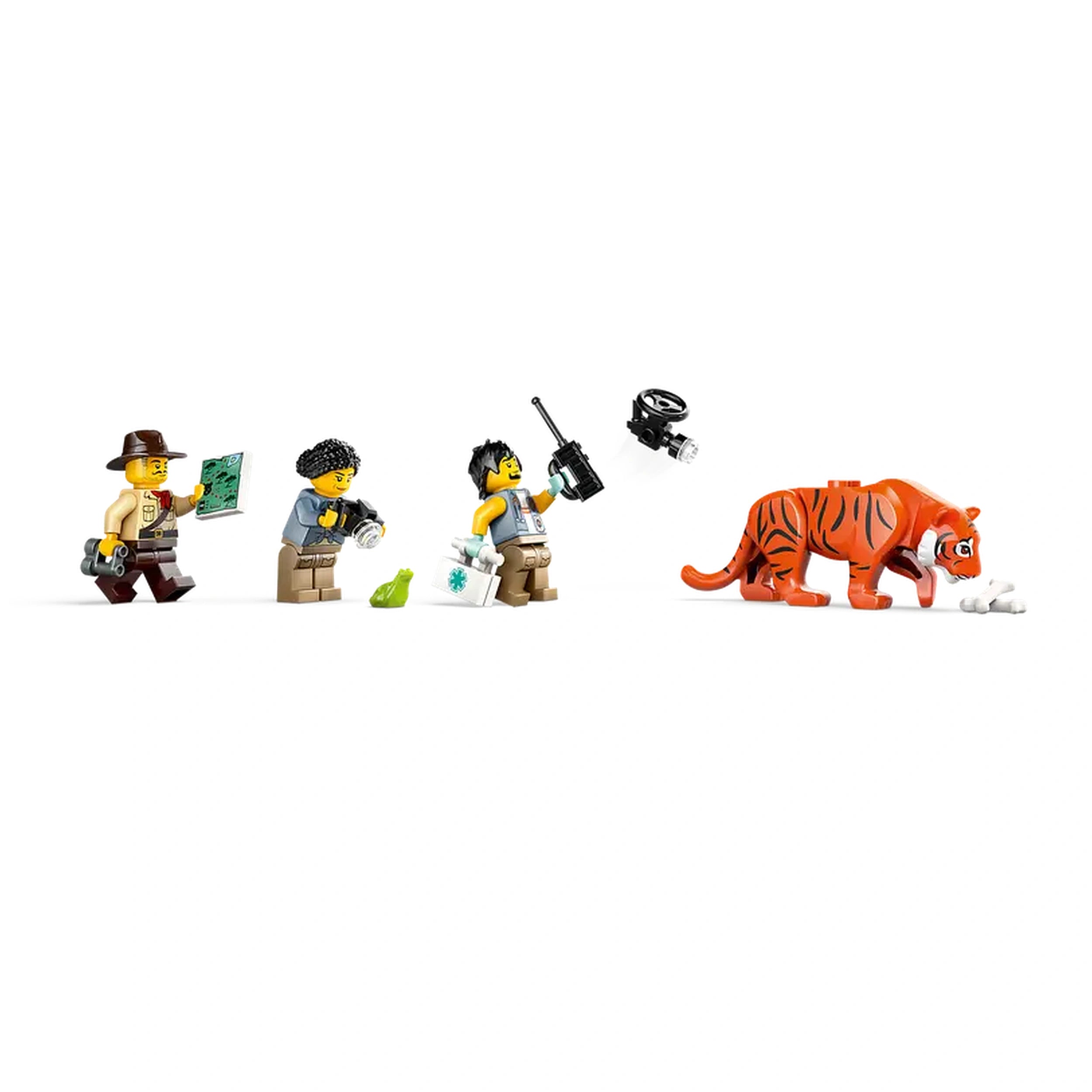 Three LEGO explorer minifigures in various poses, equipped with map, camera, and radio, accompany a vibrant orange tiger figure on a white background.