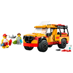 Lifeguard Beach Rescue Truck set with vibrant orange and black colors, featuring a truck, surfboards, and two minifigures near a shark.