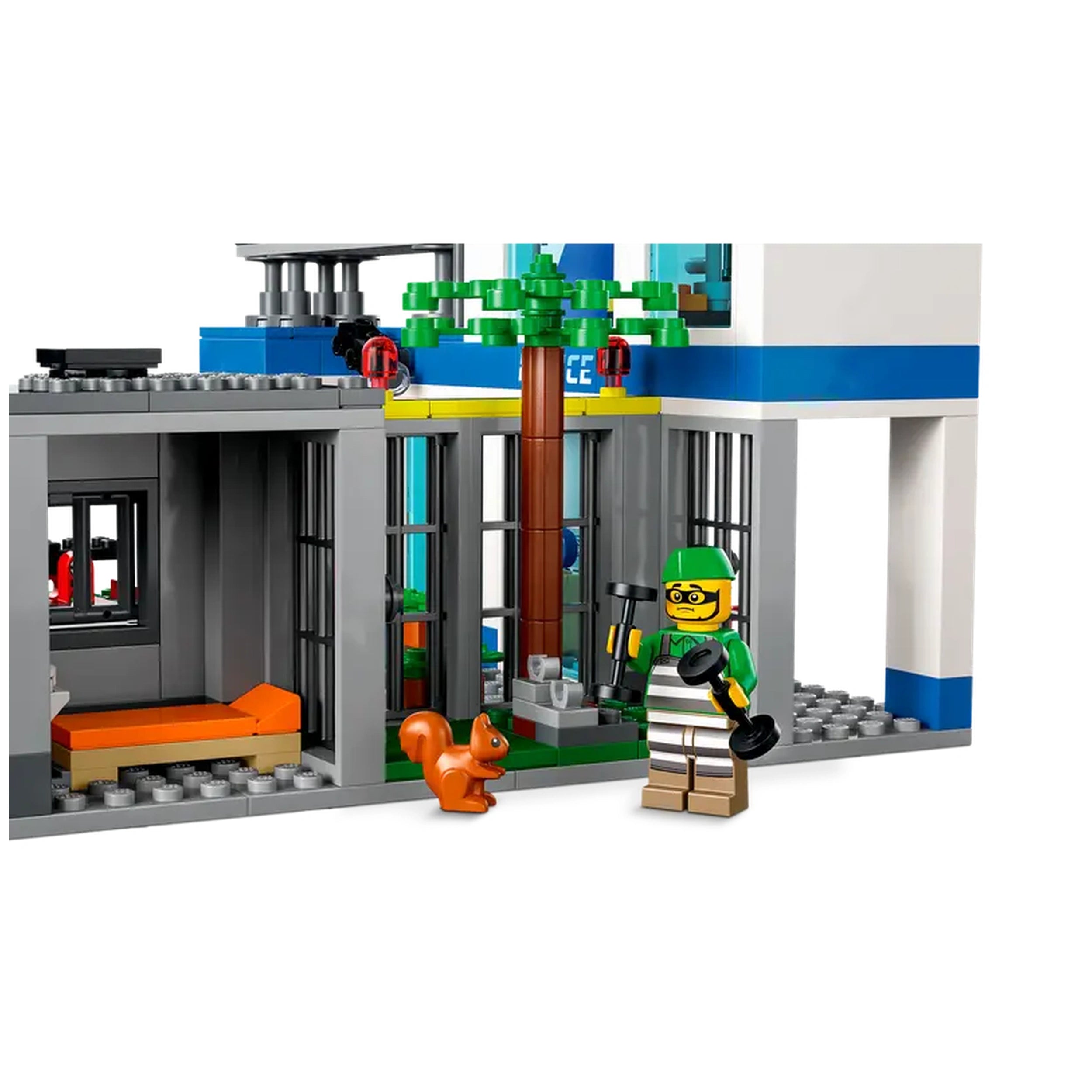 LEGO City Police Station construction set featuring a detailed jail with an orange bed and a breakout area. A minifigure in a green outfit holds tools beside a brown squirrel and a palm tree, showcasing vibrant colors and creative play elements.