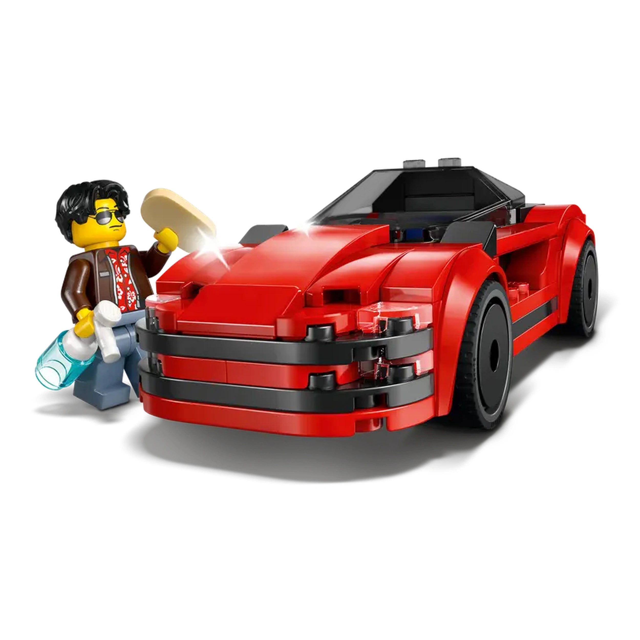 A vibrant red LEGO® City sports car with sleek design details, accompanied by a minifigure wearing sunglasses and holding a tool, ready for high-speed adventures.