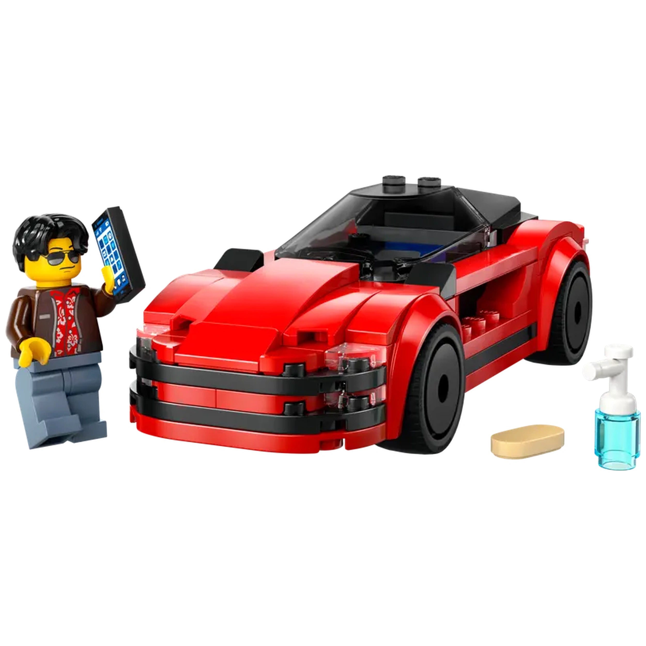 A bright red LEGO® City sports car with sleek design and black accents, accompanied by a male minifigure holding a smartphone. Nearby are a toy cleaning spray and a small sponge.