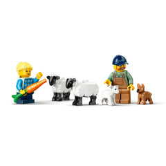 A boy holding a carrot stands next to two sheep, while a farmer with a blue hat and overalls watches. A small puppy and a lamb are also present.