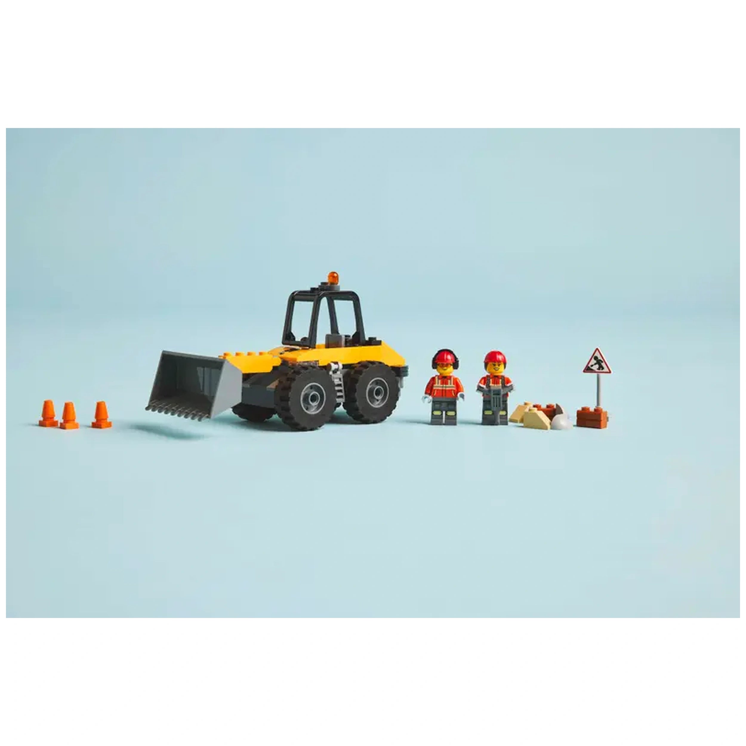 LEGO® City yellow construction wheel loader with a large bucket, accompanied by two minifigures in work attire, traffic cones, and a roadwork sign.