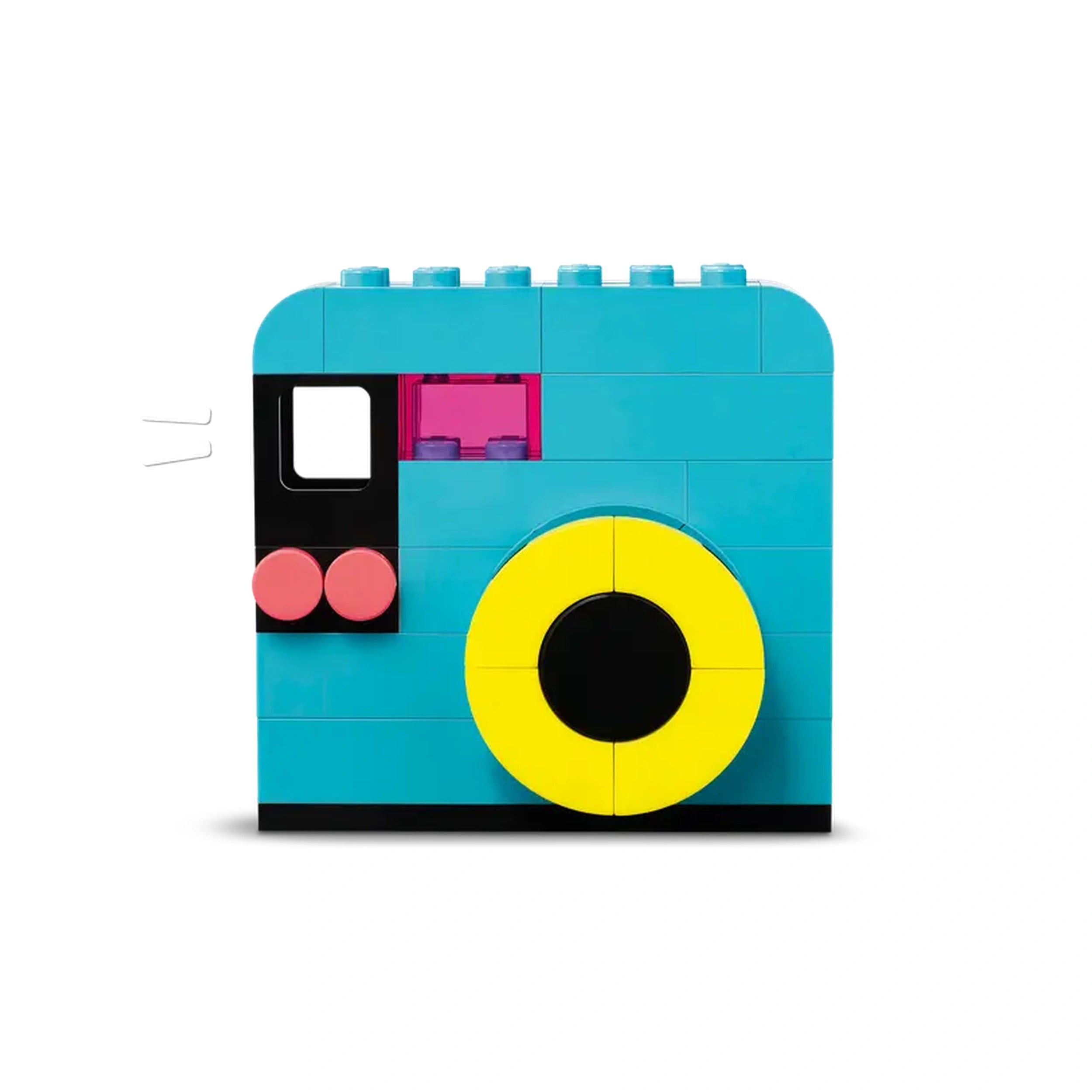 Colorful LEGO® construction set shaped like a camera, featuring a bright yellow lens, turquoise body, and playful pink elements.