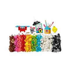 Colorful assortment of LEGO® bricks, including a red toy with eyes, a gray mouse, and a camera, arranged in rainbow stacks.