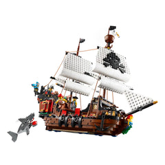 LEGO Creator 3in1 Pirate Ship construction set with intricate details, including white sails, pirate minifigures, and a shark.
