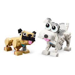 Two playful LEGO® dog figures, a tan pug with black features and a white schnauzer, both with movable heads and tails, stand on a white background.