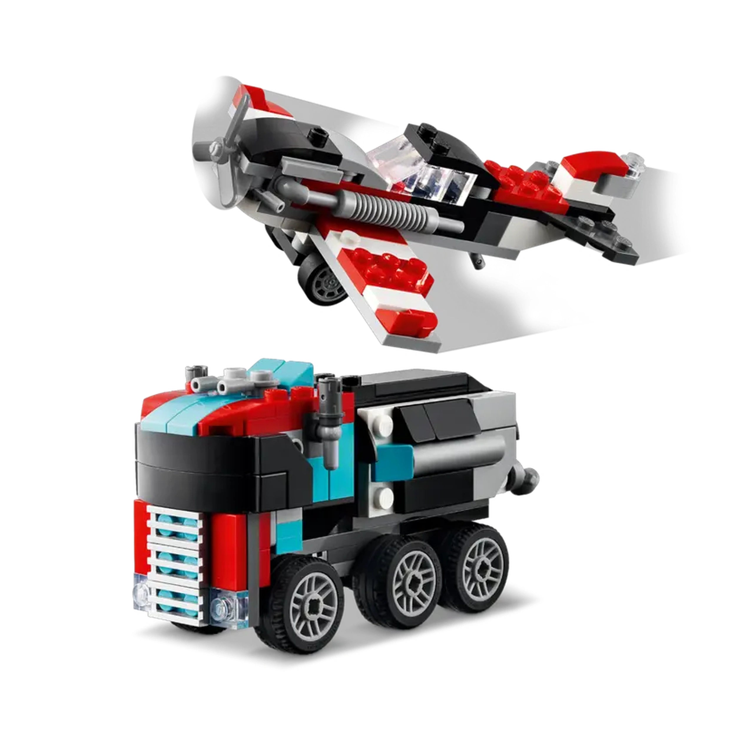 LEGO Creator Flatbed Truck in black, red, and blue, featuring moving wheels, next to a red and black helicopter with spinning rotor blades.