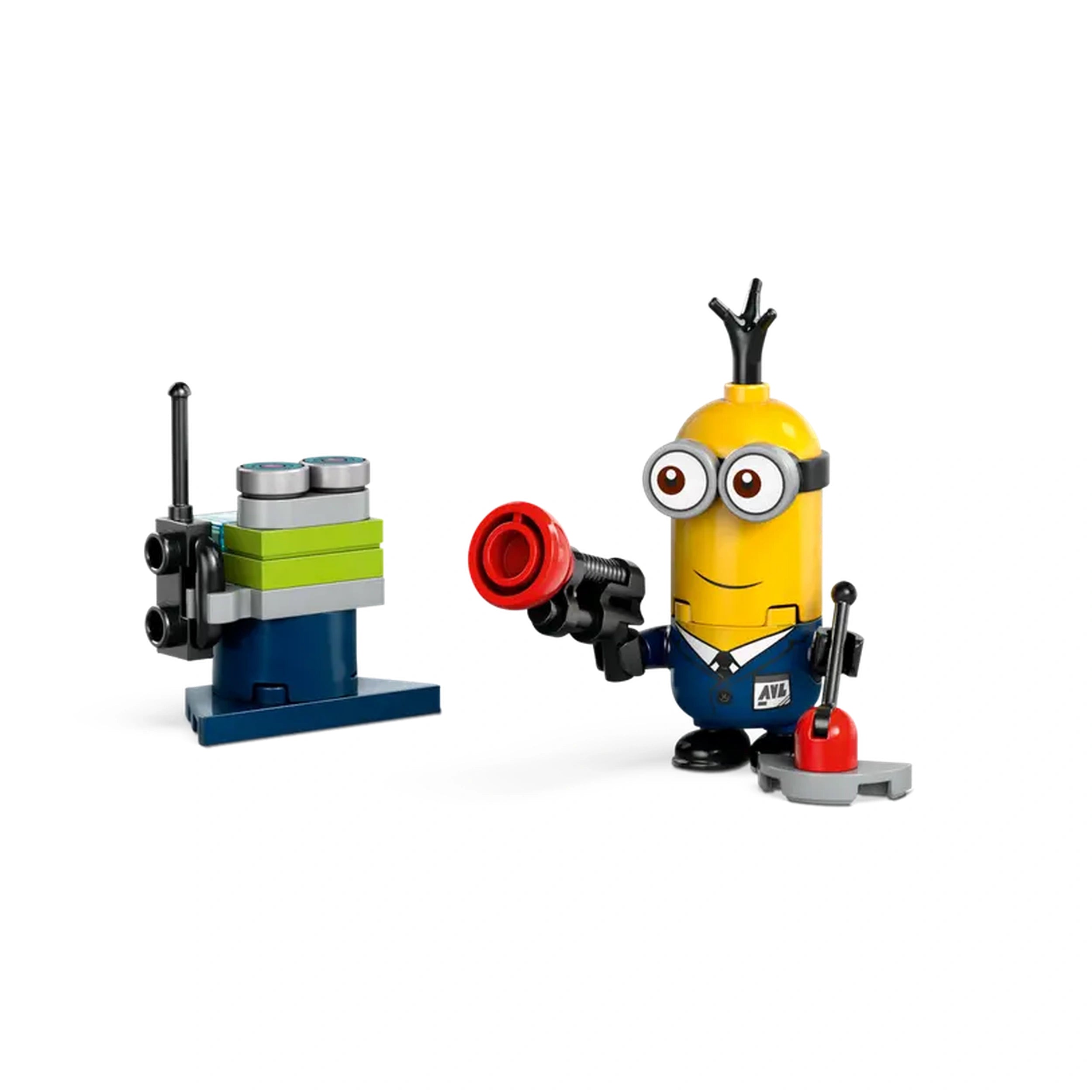 A playful AVL Minion character holds a red gadget in one hand, standing next to a colorful stack of blocks and equipment.