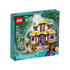 LEGO Disney Asha’s Cottage construction set featuring a two-level cottage, lush greenery, and characters engaged in joyful activities.