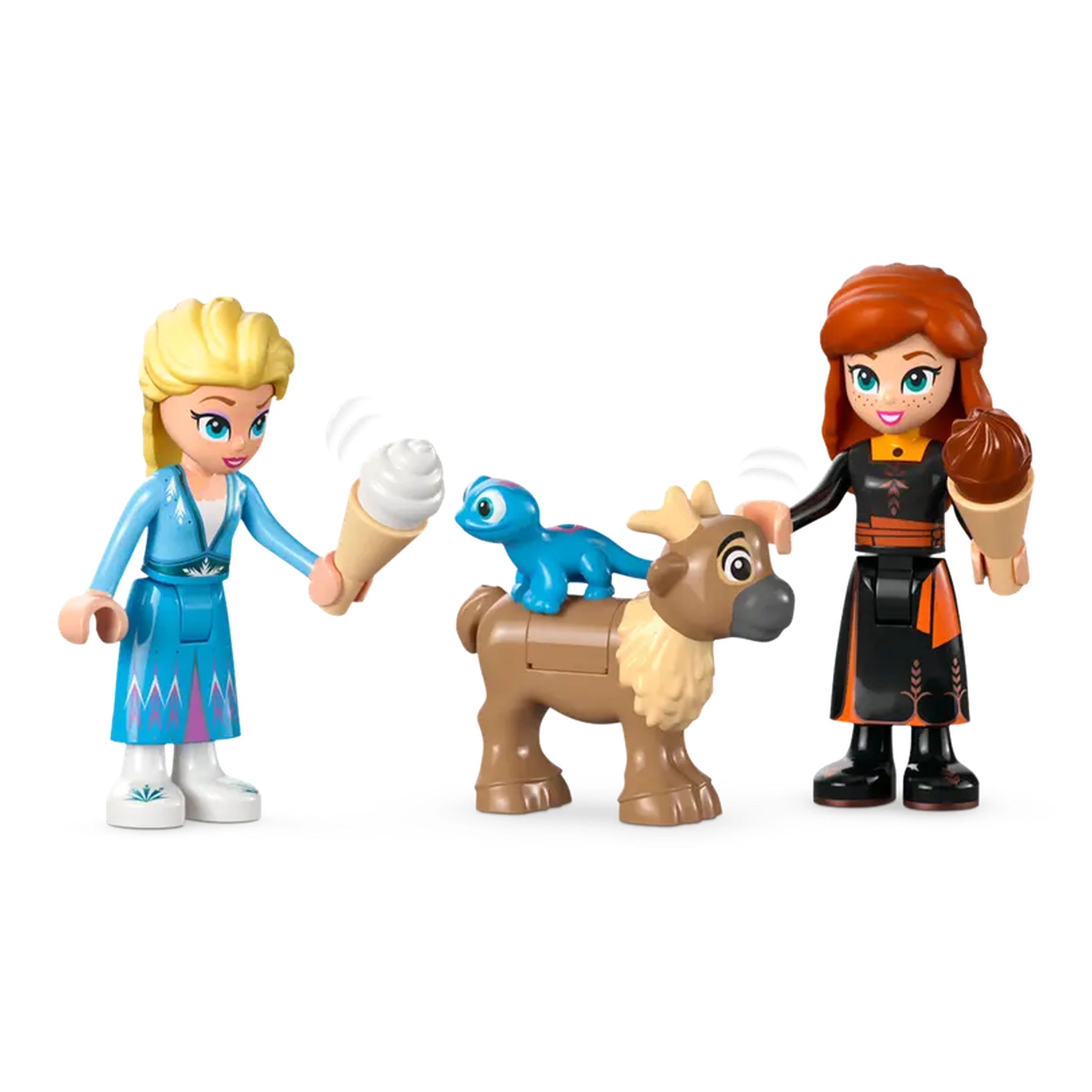 Elsa and Anna from Disney's Frozen are enjoying ice cream cones. Elsa, wearing a blue dress, smiles while holding a cone, and Anna, dressed in a black outfit, also holds an ice cream cone. A playful blue creature sits atop a brown reindeer beside them.