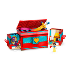 Buildable LEGO® jewelry box in bright red and turquoise, featuring Snow White and the Evil Queen mini-doll figures, with intricate details and a lockable lid adorned with a sword.