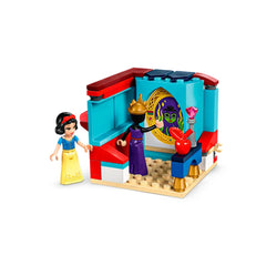 LEGO® Disney Snow White's Jewelry Box set features a vibrant build with Snow White mini-doll in a yellow dress and an Evil Queen beside a magic mirror. The colorful jewelry box has a lockable lid and a red apple nearby, inviting imaginative play and storytelling.