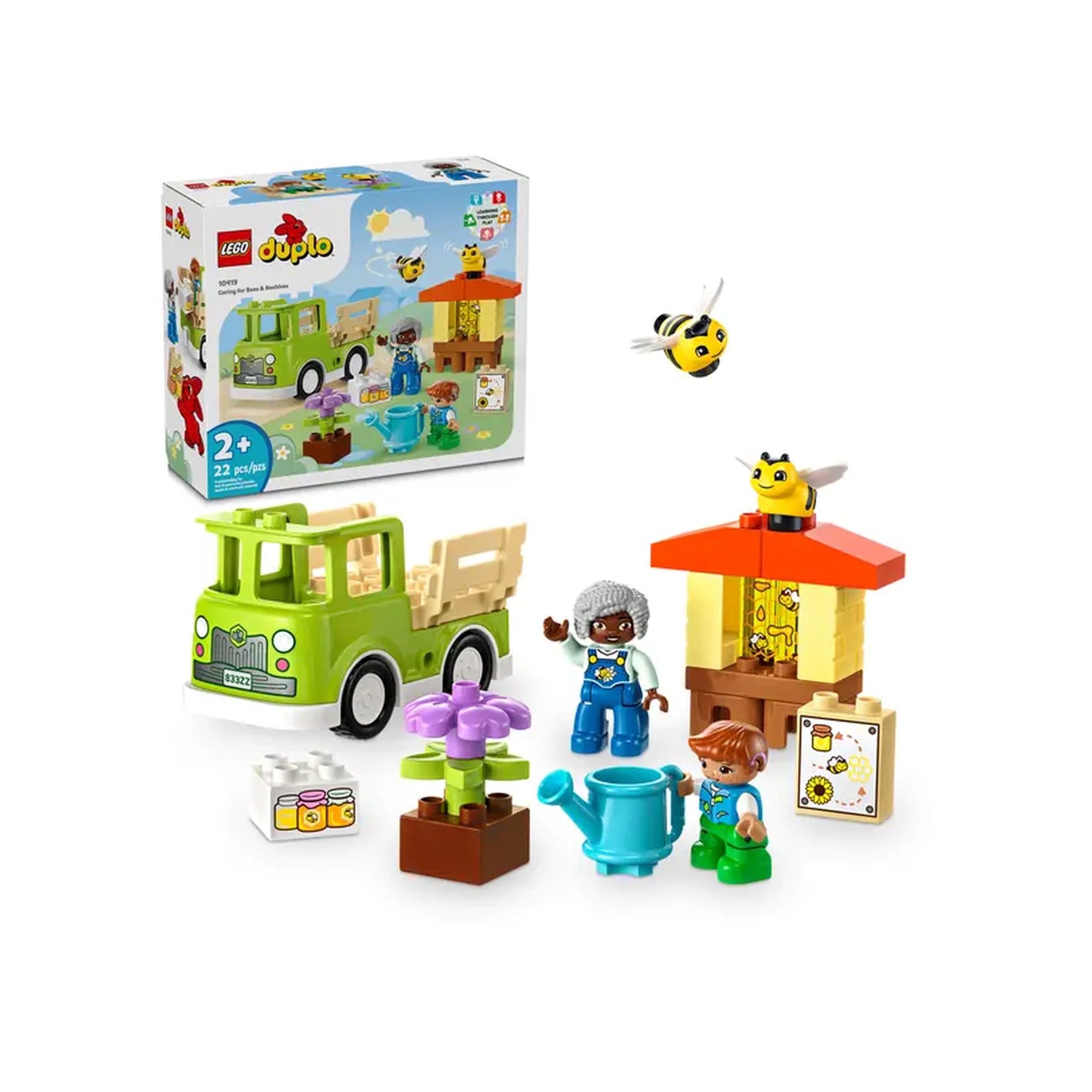 LEGO® DUPLO® Caring for Bees & Beehives set featuring a green toy truck, a beehive, two children figures, flowers, and bees.