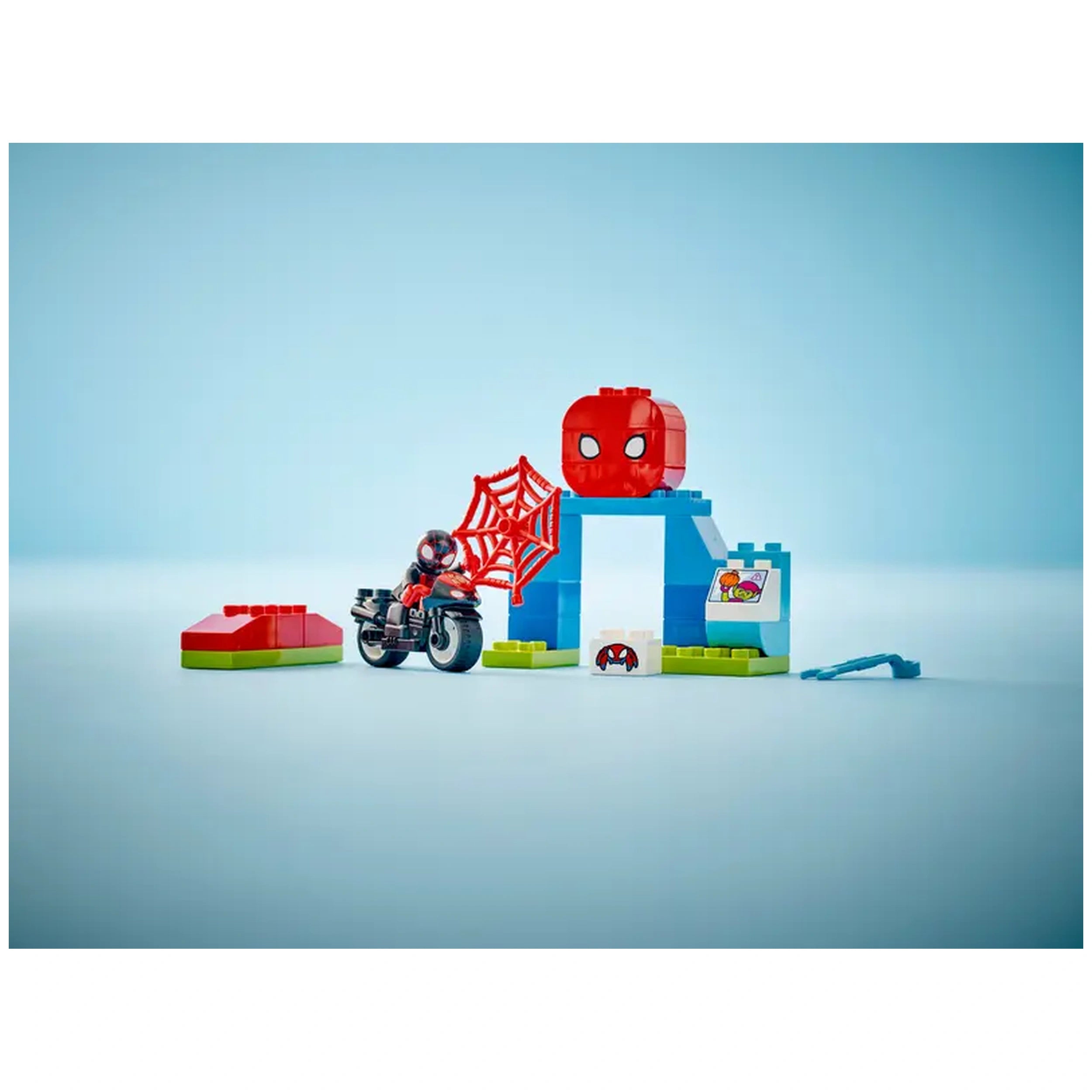 LEGO® DUPLO® Spin’s Motorcycle Adventure set featuring a colorful buildable headquarters, motorcycle, and Spidey figure with a web.