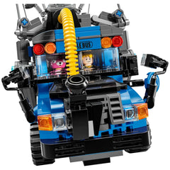 LEGO Fortnite Battle Bus construction set featuring a blue vehicle with rolling wheels, two mini-figures inside, and a vibrant yellow hose.