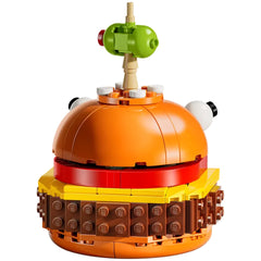 LEGO® Fortnite Durrr Burger construction set featuring a vibrant orange burger dome topped with a quirky green olive.