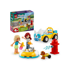 LEGO® Friends Dog-Grooming Car set featuring two mini-dolls and two dog figures, alongside a colorful buildable car, pet accessories, and a refreshing pool for bath time.