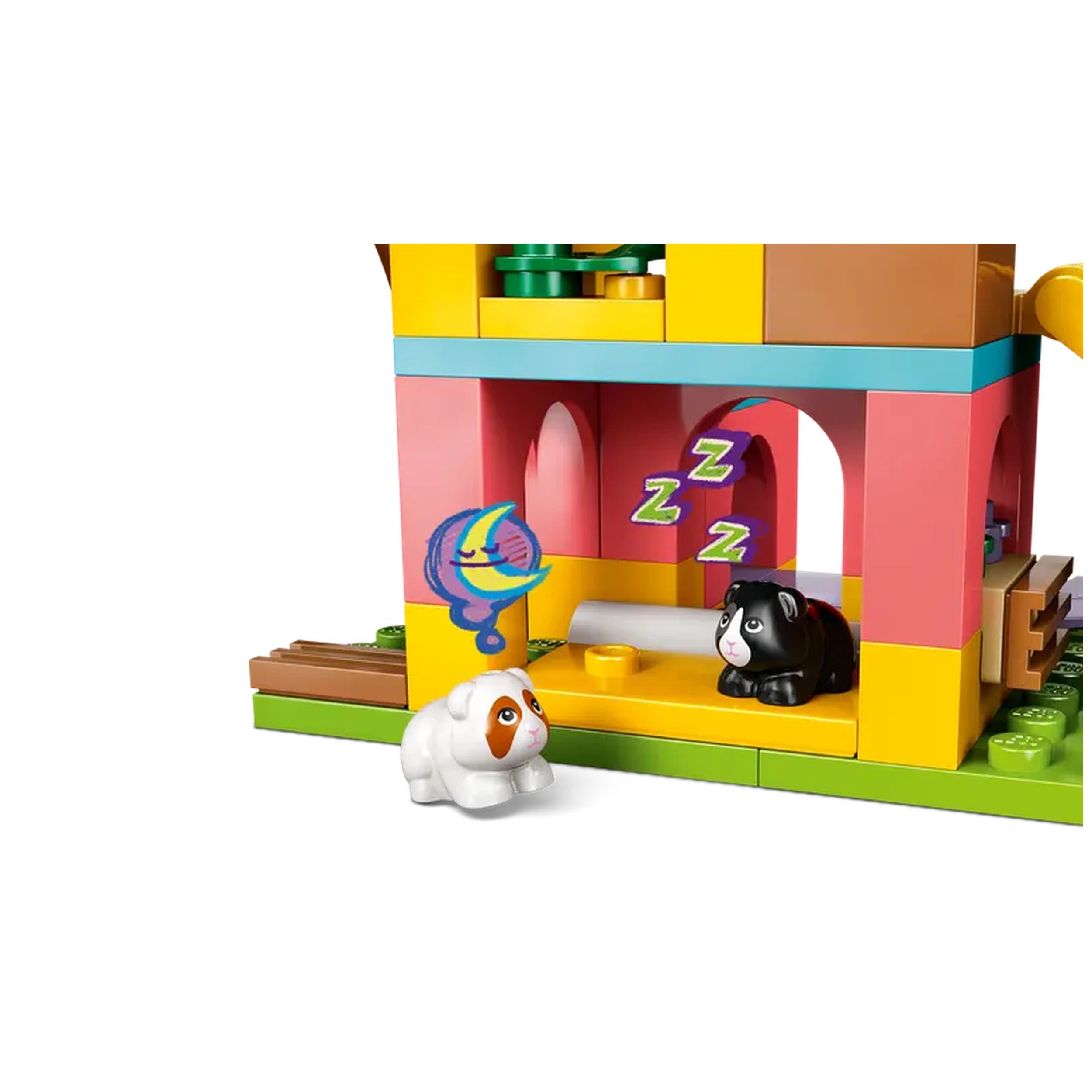 LEGO Friends Guinea Pig Playground set featuring two guinea pig figures, one white and one black, inside a colorful playhouse with playful decorations.