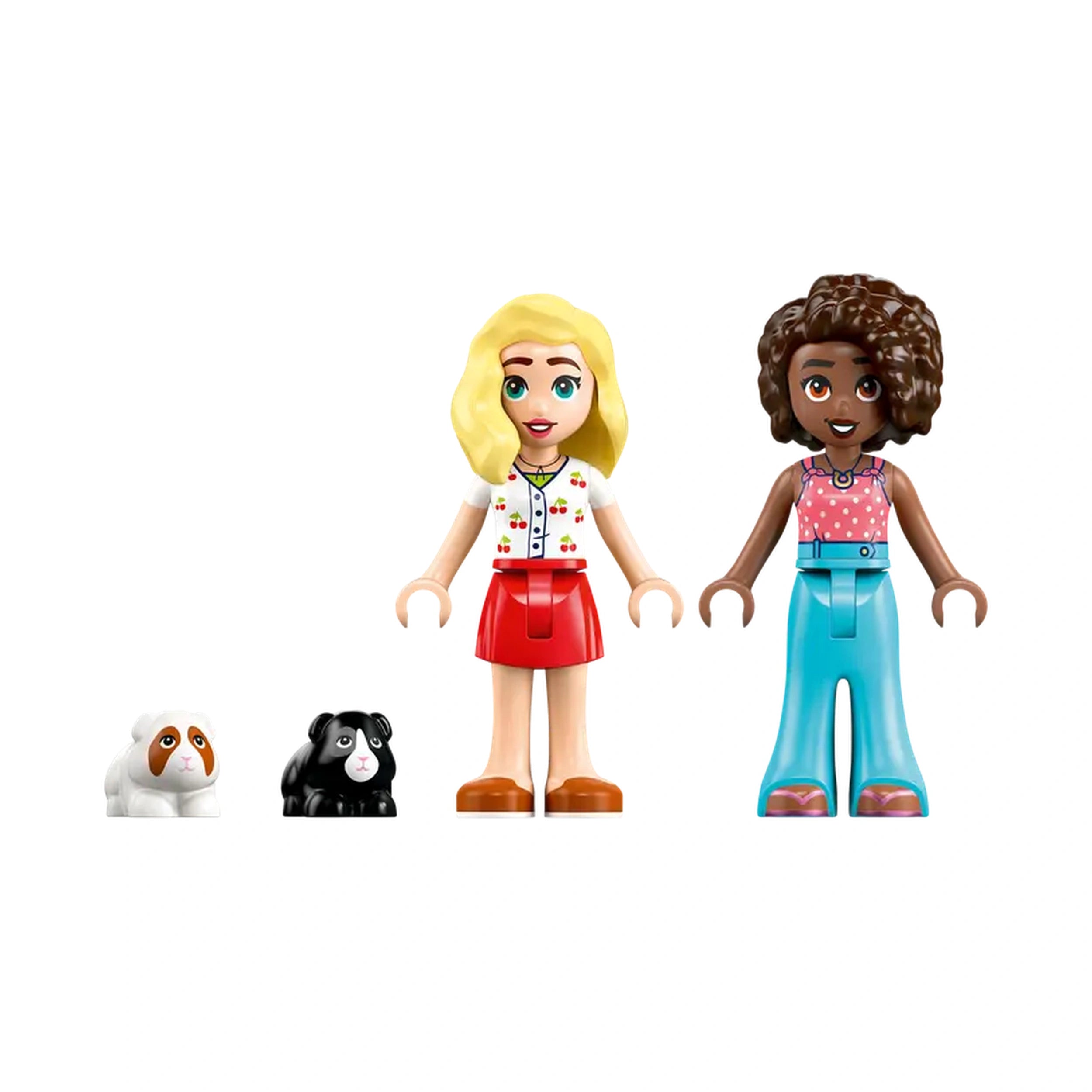 Two LEGO Friends minidolls with blonde and curly hair stand side by side, accompanied by two guinea pig figures, one white and brown, and one black. The dolls are dressed in colorful outfits, ready for imaginative play.