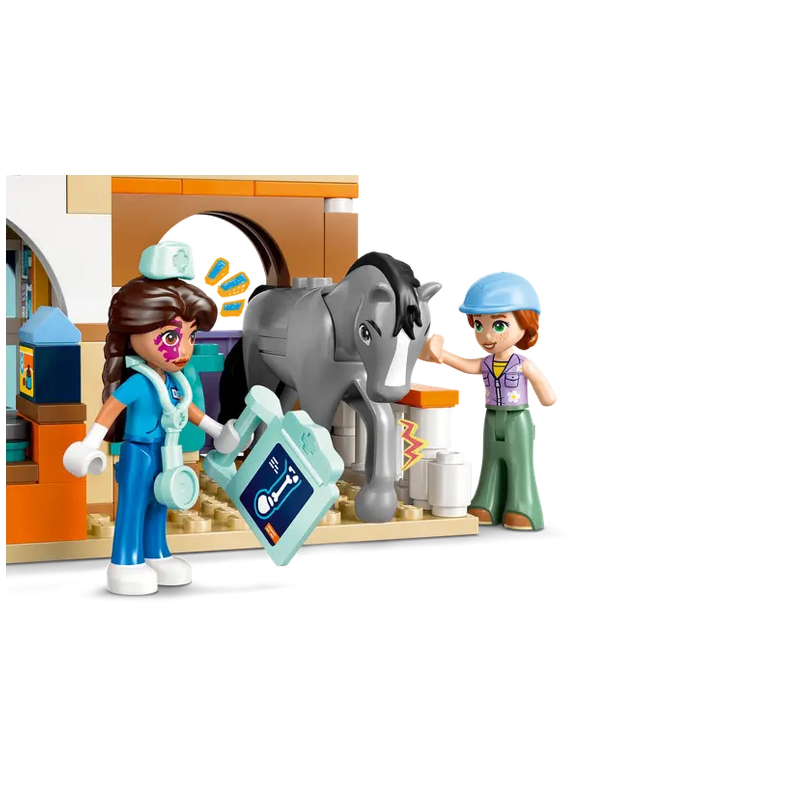 A veterinarian in blue scrubs holds a medical kit while standing next to a gray horse. A second character, wearing a hat and a purple shirt, smiles and interacts with the horse. The colorful veterinary clinic background displays shelves and tools for animal care.
