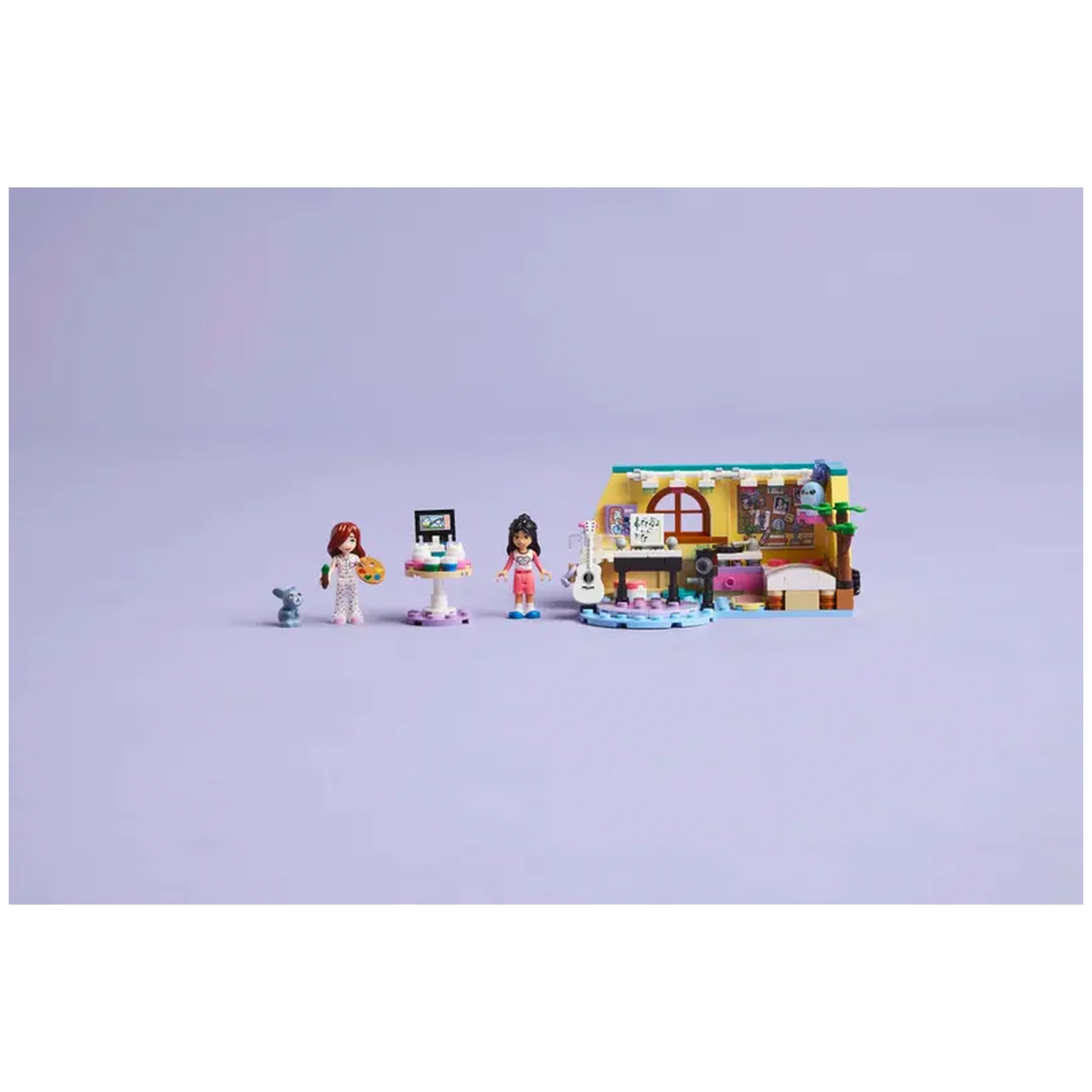 LEGO Friends Paisley’s Room construction set featuring two minidolls, a pet bunny, an art easel, and a colorful room backdrop.