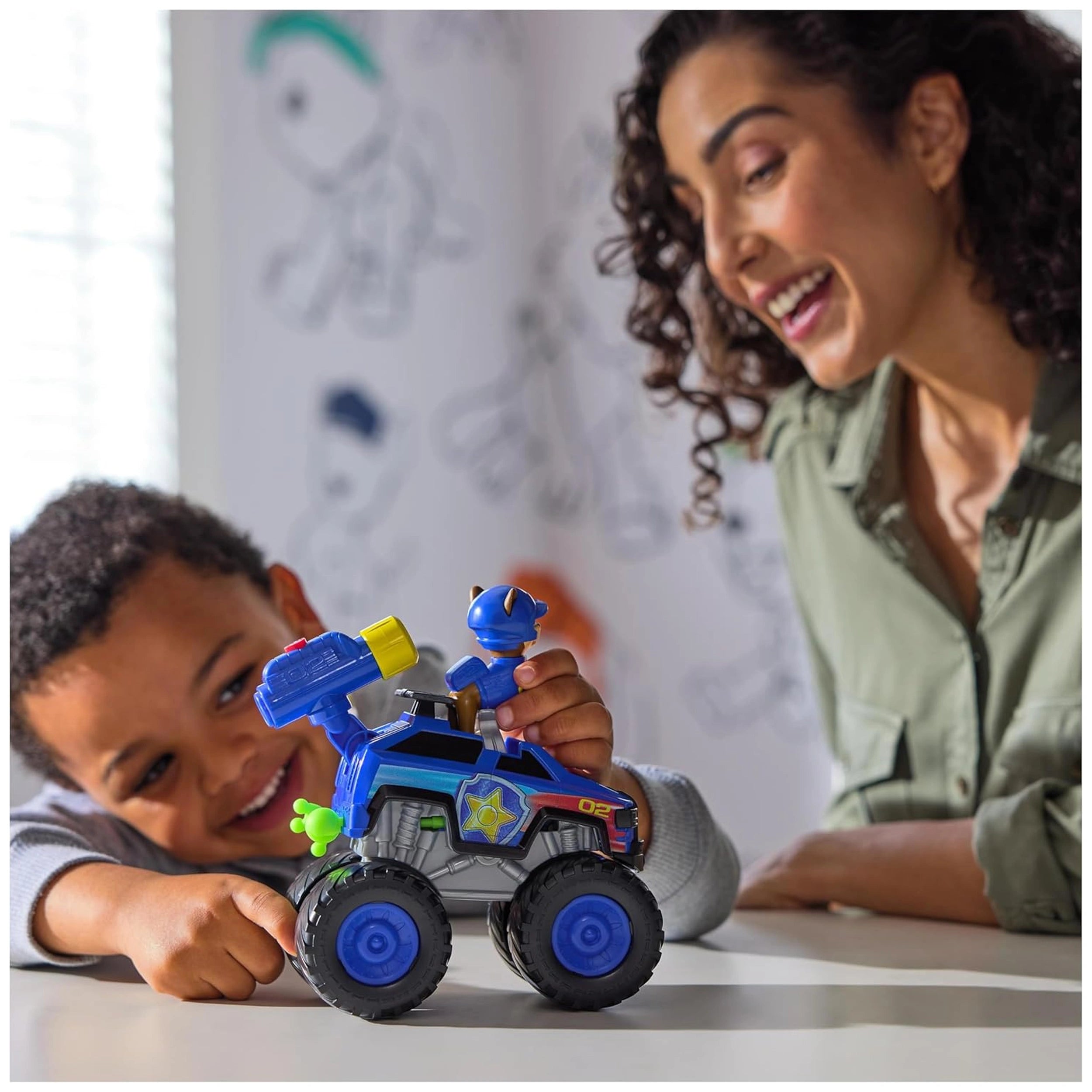 Spin Master - Paw Patrol - Chase Rescuse Wheels Cruiser with action figure and play vehicle