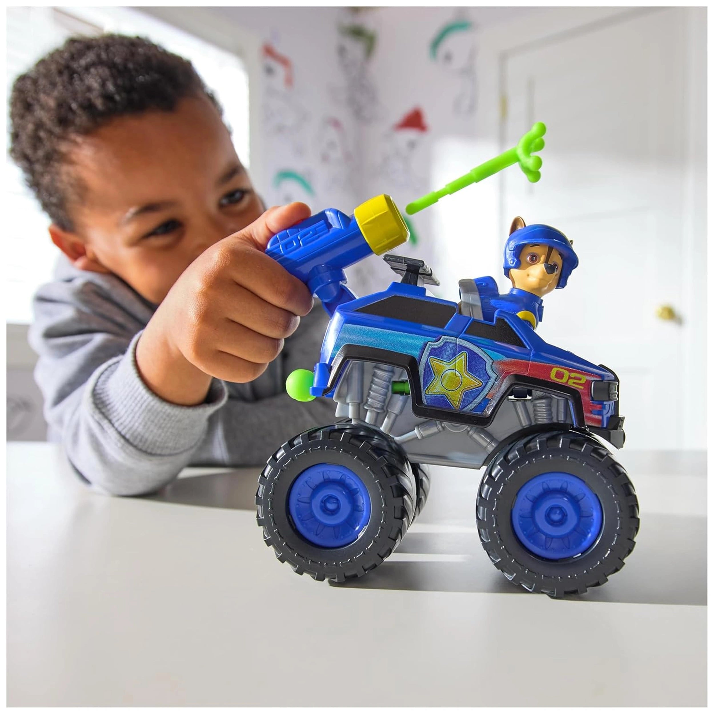 Spin Master - Paw Patrol - Chase Rescuse Wheels Cruiser with action figure and play vehicle