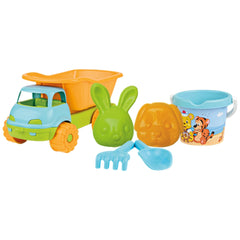 Colorful beach toy set with blue and orange truck, bucket with Winnie The Pooh design, green bunny mold, and blue tools.
