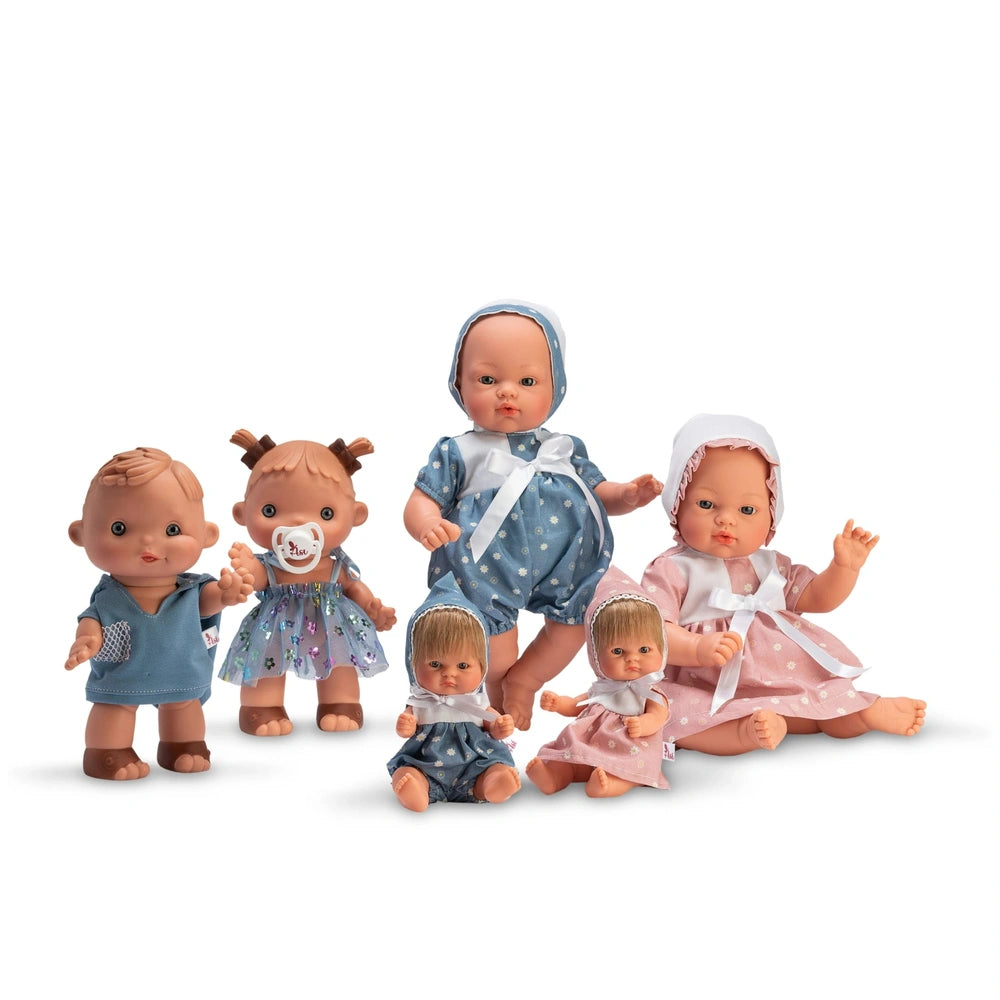 Group of ASI Dolls from Bonboncin Collection in colorful outfits, including blue and pink dresses, ideal for imaginative play.