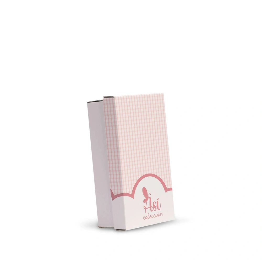Pink checkered ASI Doll packaging with logo, featuring soft hues and rounded design elements.