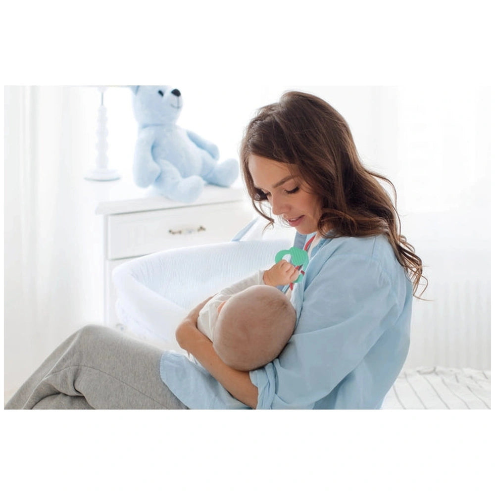 Baby Clementoni Doudou Sweet Bunny Comforter is nestled in a woman's arms as she gazes lovingly at the wrapped infant.