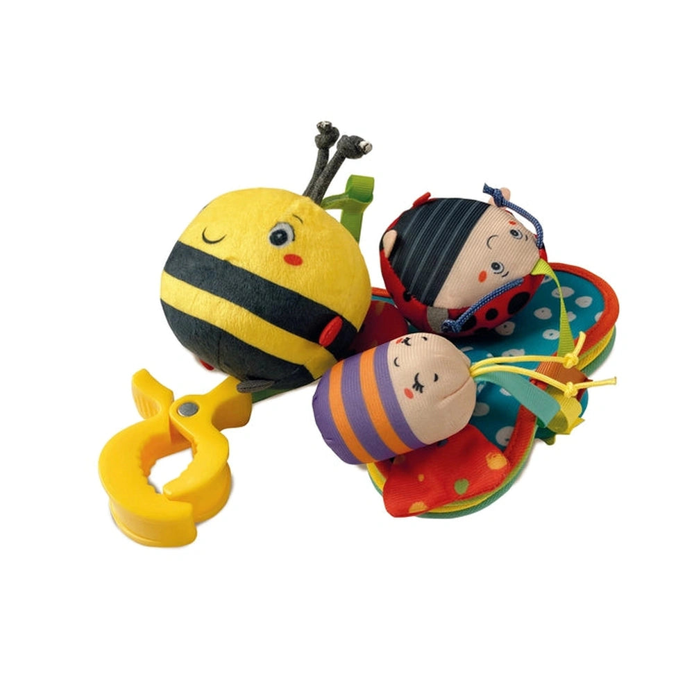 Baby Clementoni travel mobile features colorful, soft fabric toys including faces and a handle, arranged in a playful scatter