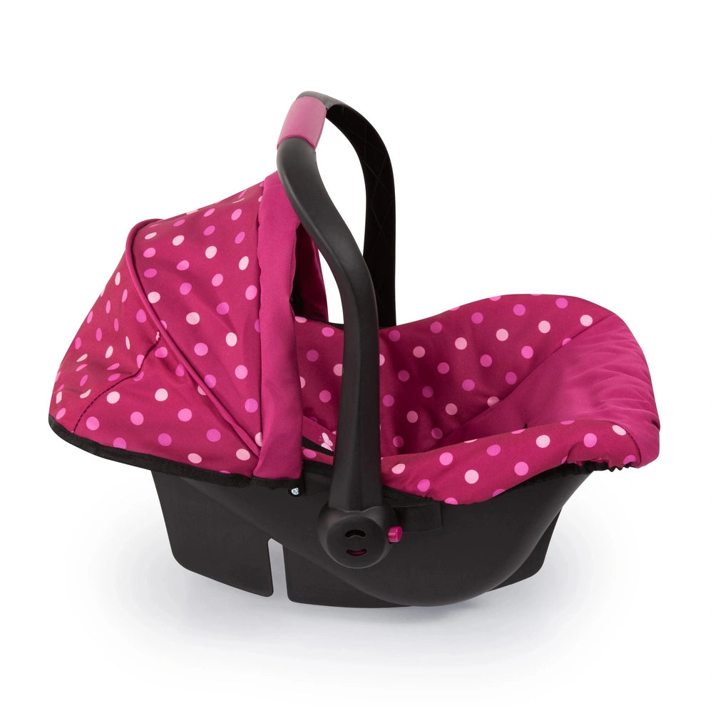 BAYER DESIGN Doll Deluxe Car Seat features a black frame with pink accents and a pink polka dot canopy.