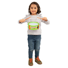 Bontempi Marching Drum Play Green held by a smiling girl in a gray sweater and blue jeans, with a green bucket in her hands.