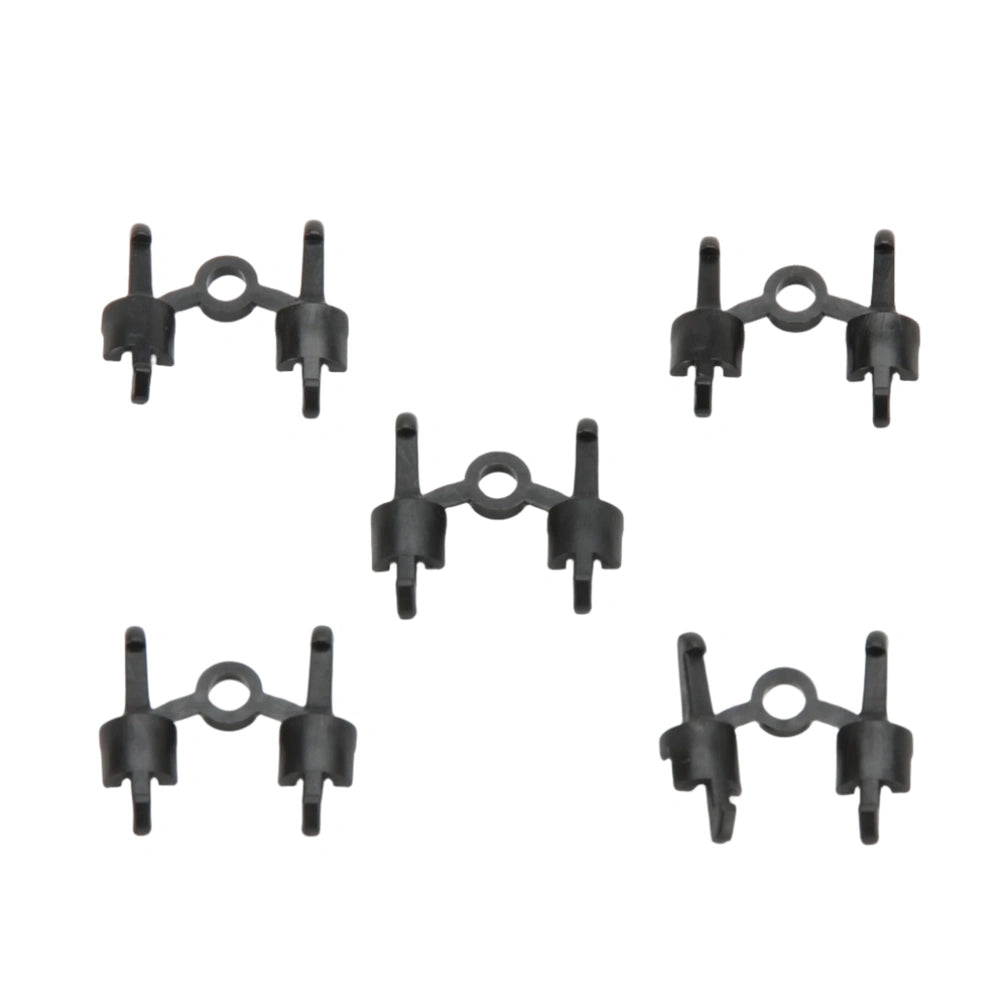 Five black spare couplings arranged in a pattern, compatible with Bruder toy vehicles.