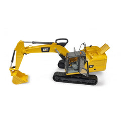 Yellow Bruder CAT Excavator toy with tracked wheels and movable arm, positioned side view against a white background.