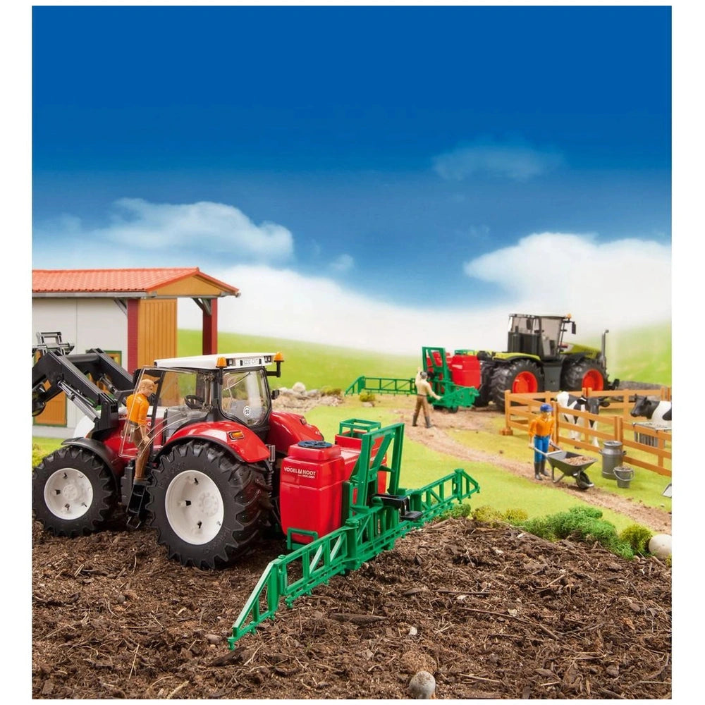 Red and green toy tractors with farming equipment in a farm scene, featuring barns, fences, and miniature animals.