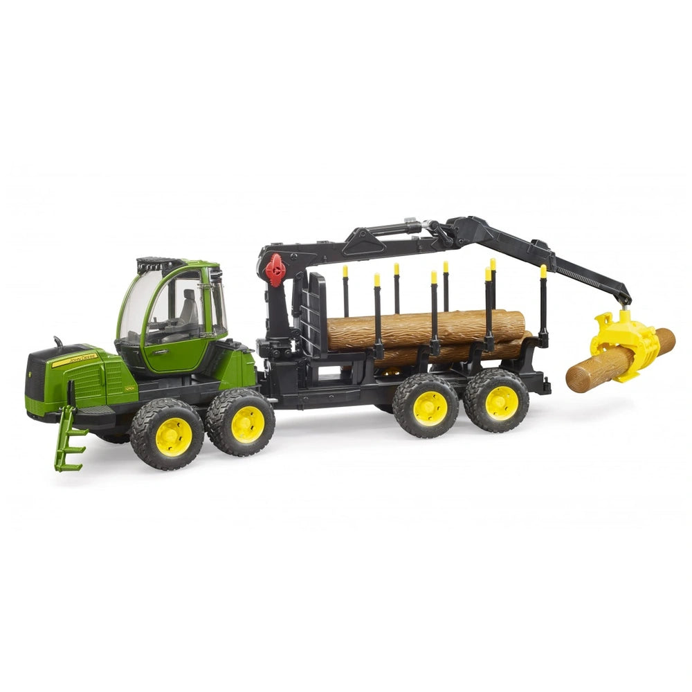 Bruder John Deere 1210E toy forwarder with crane, 4 trunks, and yellow grab on white background.