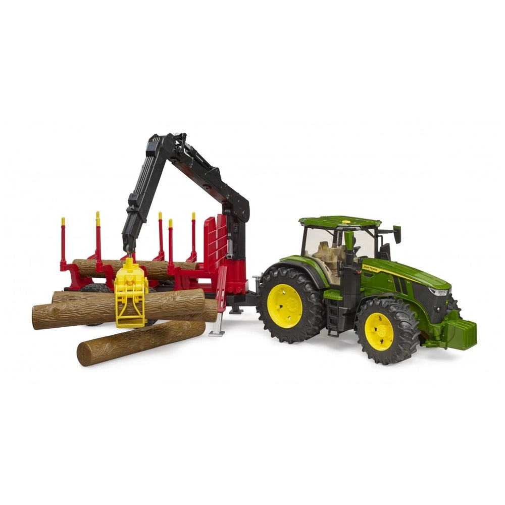 Green John Deere tractor with yellow wheels towing a red forestry trailer carrying tree trunks with a mechanical arm.