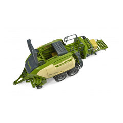 Bruder Krone Big Pack 1290HDP toy baler with green and beige body, foldable pick-up, and two hay bales.