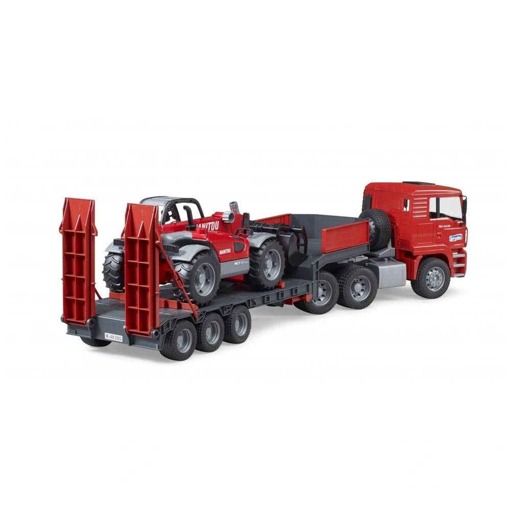 Red Bruder MAN TGA truck with a low loader trailer carrying a Manitou telehandler, highlighting realistic details in children's toy.
