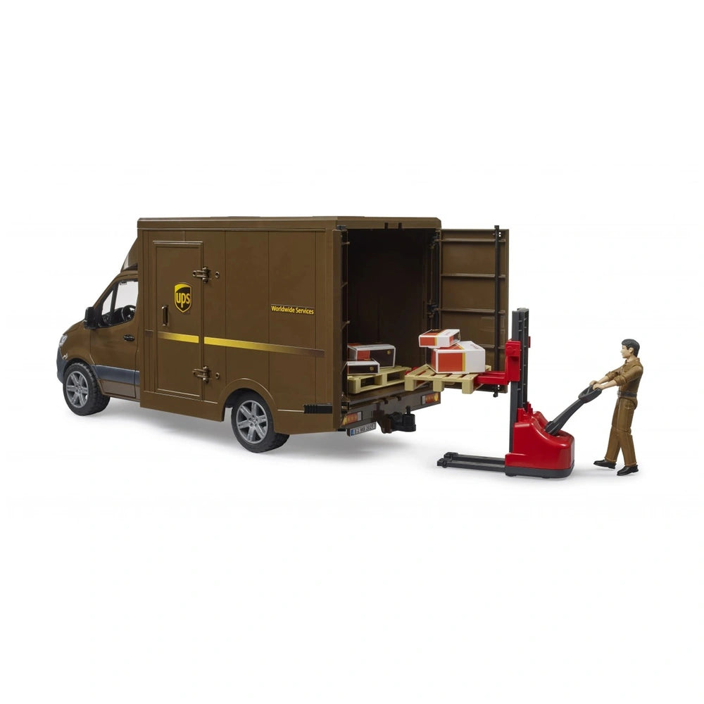Brown UPS toy delivery van with open doors, packages inside, driver in uniform using a red pallet jack.