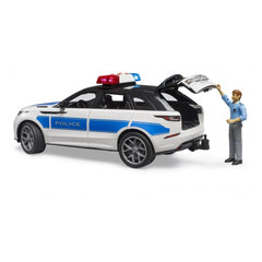 Bruder Range Rover Velar Police toy with officer, rear door open, blue and white with lights, 1:16 scale model.