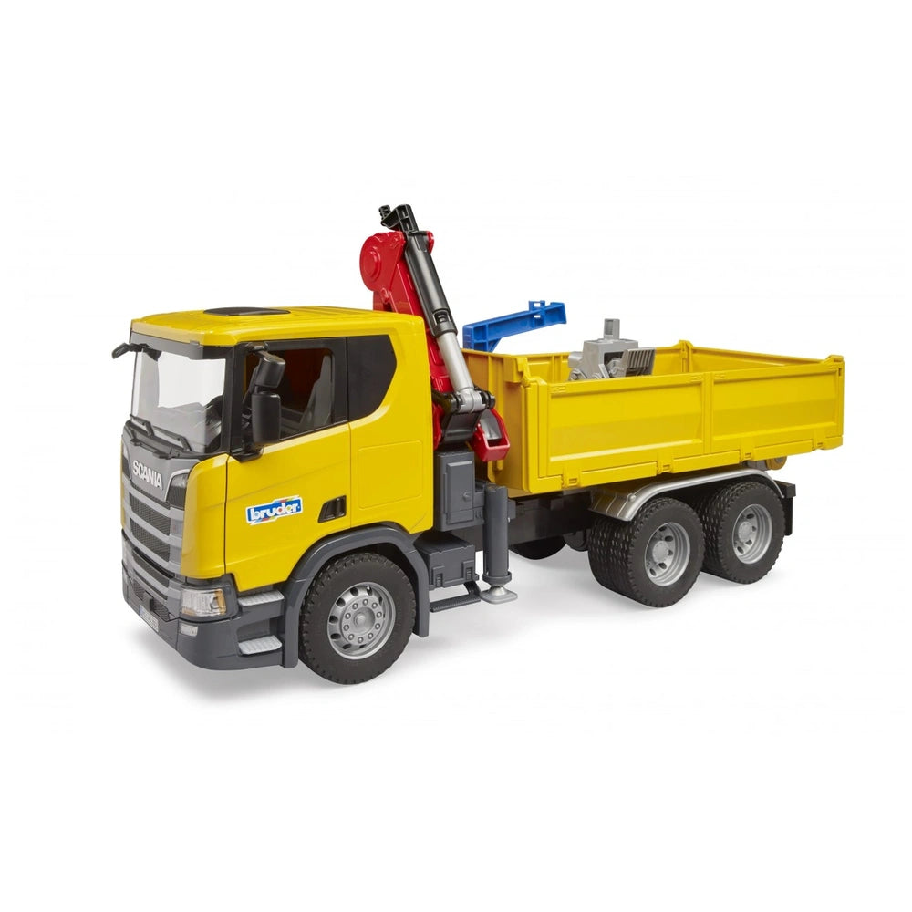 Yellow Bruder Scania Super 560R toy truck with red crane and two pallets on the truck bed, detailed design suitable for kids.