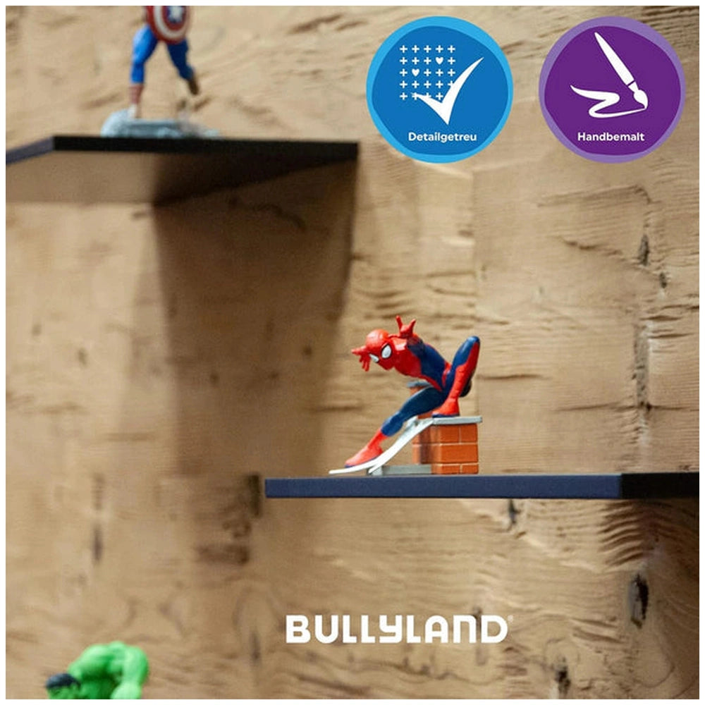 Bullyland Avengers Spider-Man action figure stands prominently against a colorful matte cardboard backdrop with glossy accent