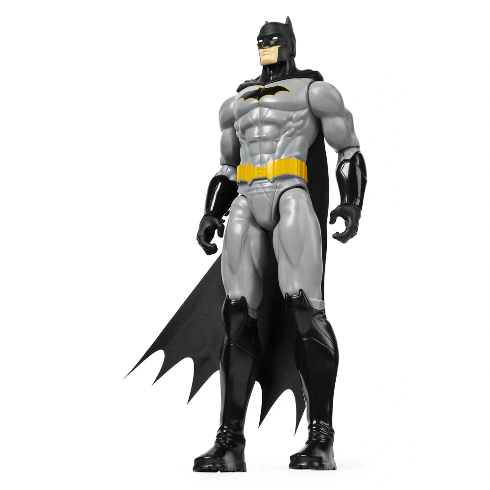 DC Comics Batman Rebirth action figure stands 30 cm tall, featuring a gray costume, black cape, and yellow utility belt.