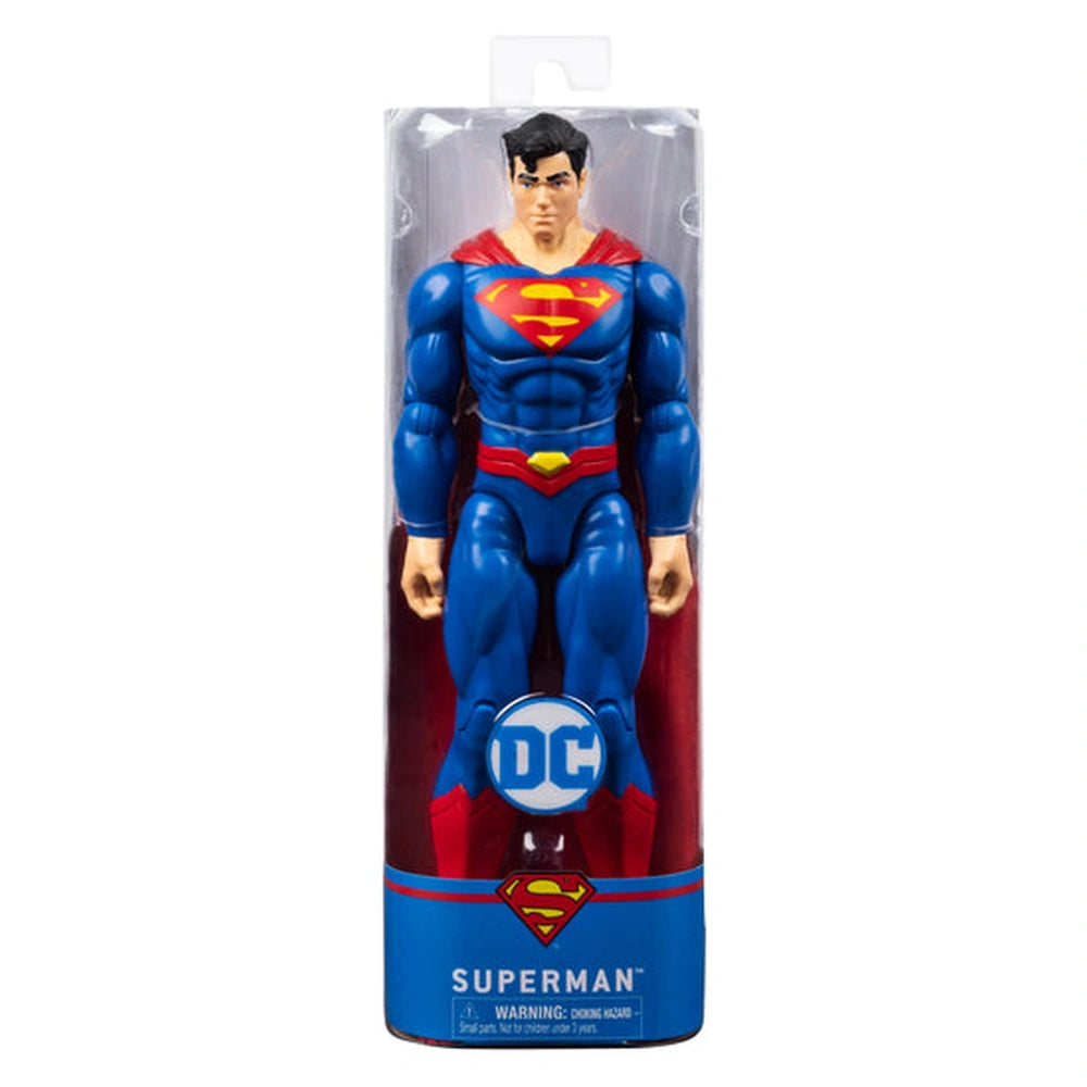 Superman action figure in a clear plastic package, featuring a blue suit, red cape, and iconic "S" emblem on the chest.
